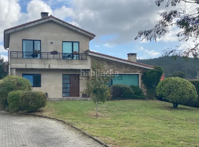 Foto a2c6e67c-047a-4278-b47d-8cfdbacb45a0. Casa en O Milladoiro Ames