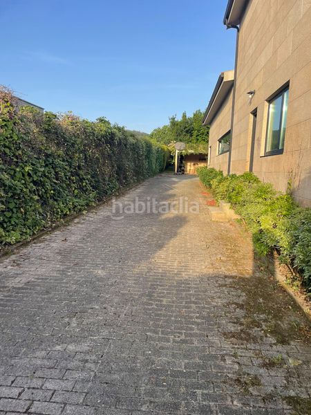 Foto c4a1c3f2-52a6-4d09-a3cf-ad3d2ee8f5e1. Casa en O Milladoiro Ames
