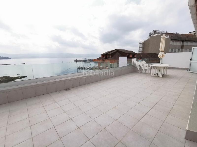 Foto 88256bac-0658-4ee4-b406-99f446df06cc. Ático piso bonito en venta con terraza y vistas al mar en Sanxenxo