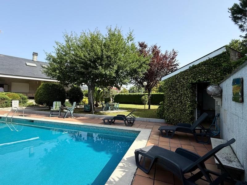 Foto 98adfb9e-1bb6-4c1d-94c7-fb932962a89e. Casa en venda (a)-san martiño 71 casa con terreno y piscina en a derrasa en Pereiro de Aguiar (O)