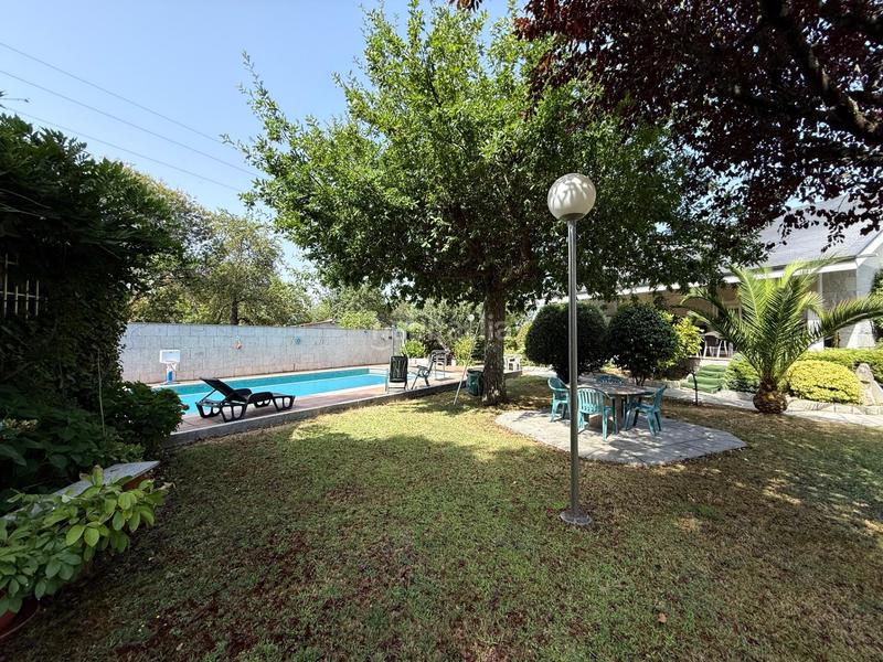 Foto edb96be2-872b-4521-8c69-fc789448f8b5. Casa en venda (a)-san martiño 71 casa con terreno y piscina en a derrasa en Pereiro de Aguiar (O)