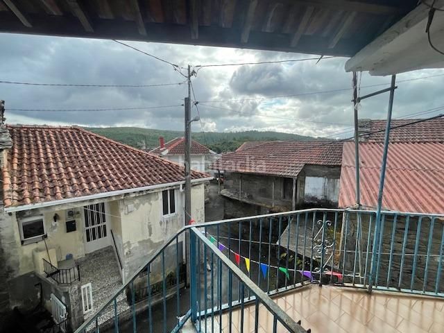 Foto 6d796100-46e2-43e5-bbb5-8b6cb389db34. Casa adossada amb aparcament a Irixo (O)