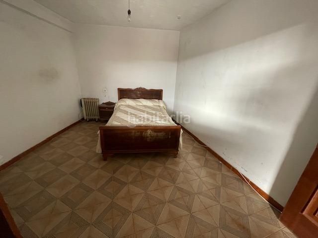 Foto b197aeed-f623-4f77-9b53-d95e8591db13. Casa adossada amb aparcament a Irixo (O)