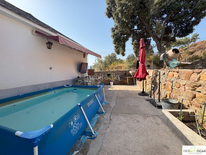 Foto 89599368-19f4-4ac5-aa2a-b812fe497909. Xalet amb aparcament a Navahermosa