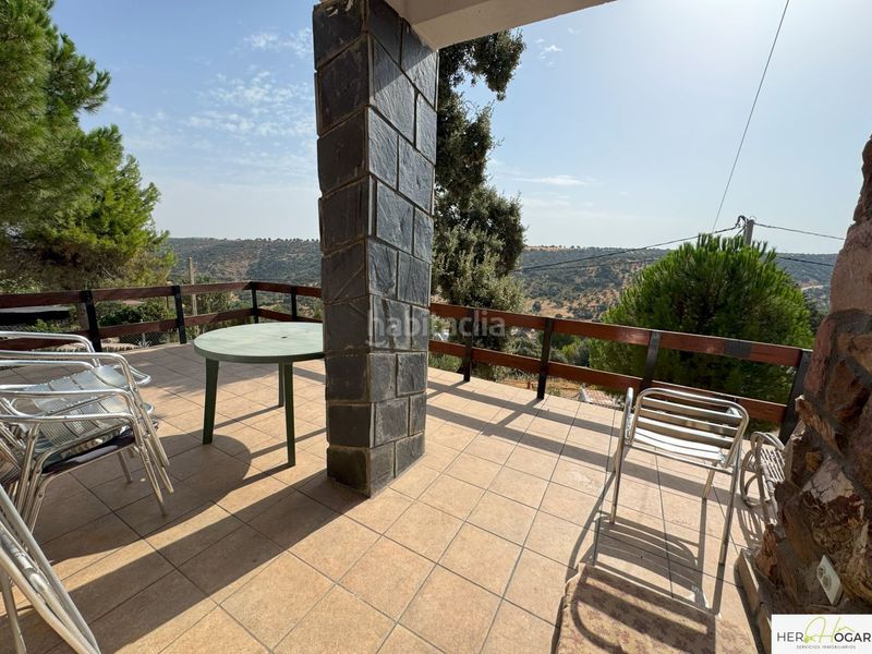 Foto cf7f12c2-6d52-4ee9-a11a-a010f3f80e10. Xalet amb aparcament a Navahermosa