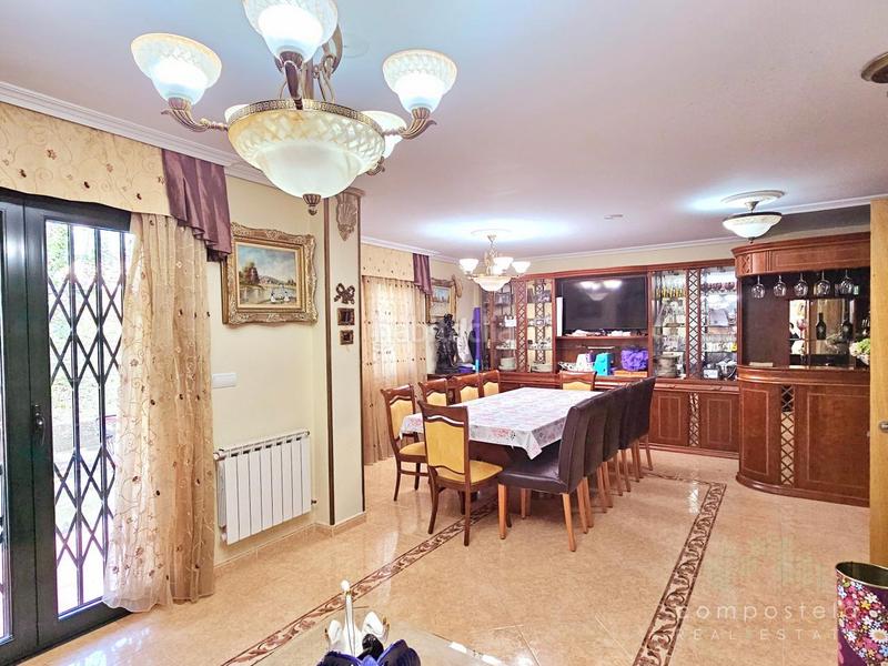 Foto dbad95bb-b815-4184-a8ca-767e5caadc81. Casa aparellada amb calefacció aparcament piscina a Santiago de Compostela