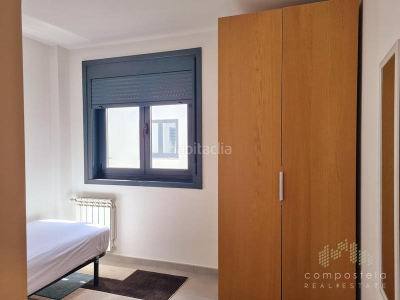 Foto 322d7ac9-a801-432c-b87f-62489aee07a2. Àtic amb calefacció aparcament a O Milladoiro Ames
