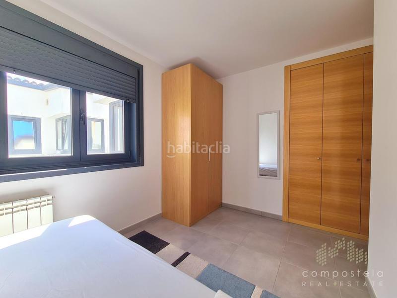 Foto c3408d9b-1934-44fa-979e-80422e47360e. Attico con riscaldamento parcheggio in O Milladoiro Ames