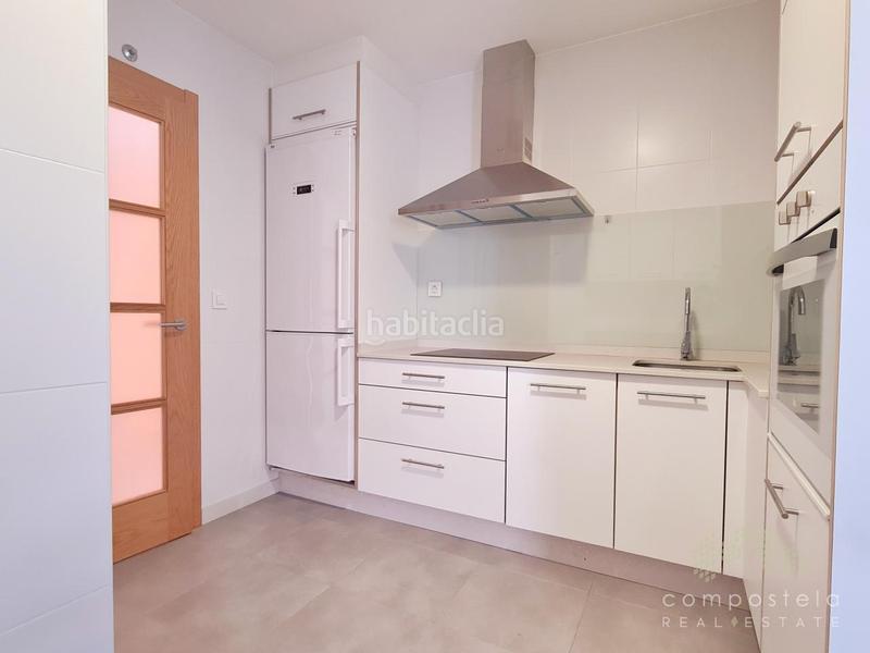 Foto 1045f1fb-8328-4b23-ba9a-bf0123508e42. Penthouse with heating parking in O Milladoiro Ames