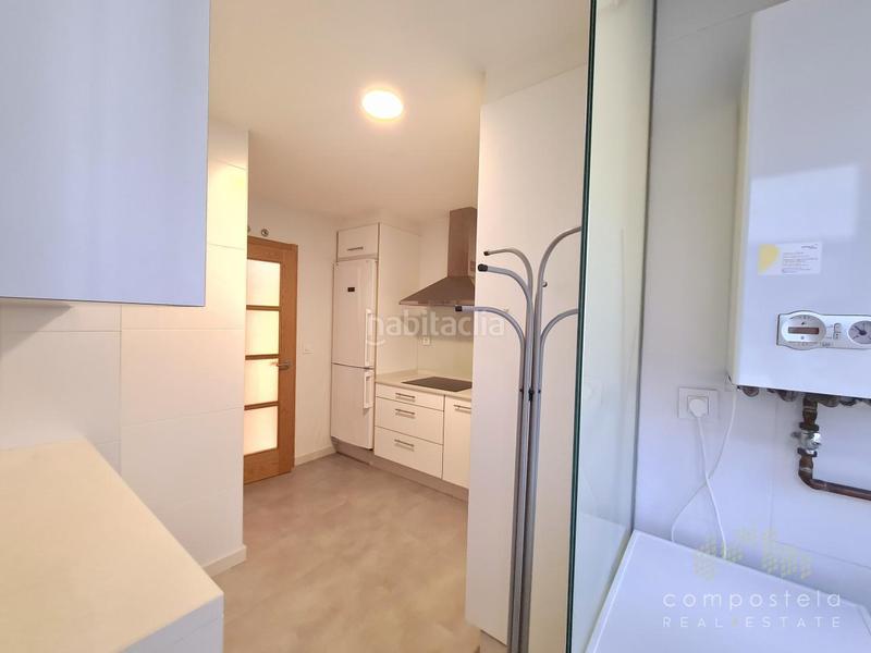 Foto 556a93f8-fc1a-49ce-aca1-a24decd937db. Penthouse with heating parking in O Milladoiro Ames