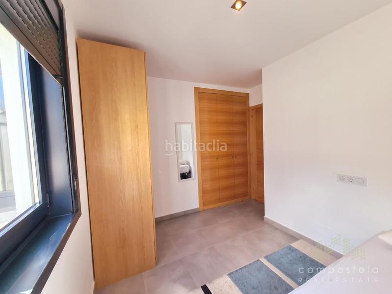 Foto 6487baca-2633-4e84-a1c3-0a6c401bfe74. Penthouse with heating parking in O Milladoiro Ames