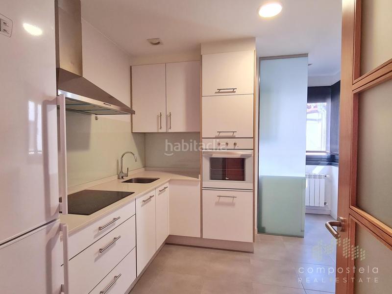 Foto 64e394ad-2eac-44d7-85a2-668c35d65f66. Penthouse with heating parking in O Milladoiro Ames