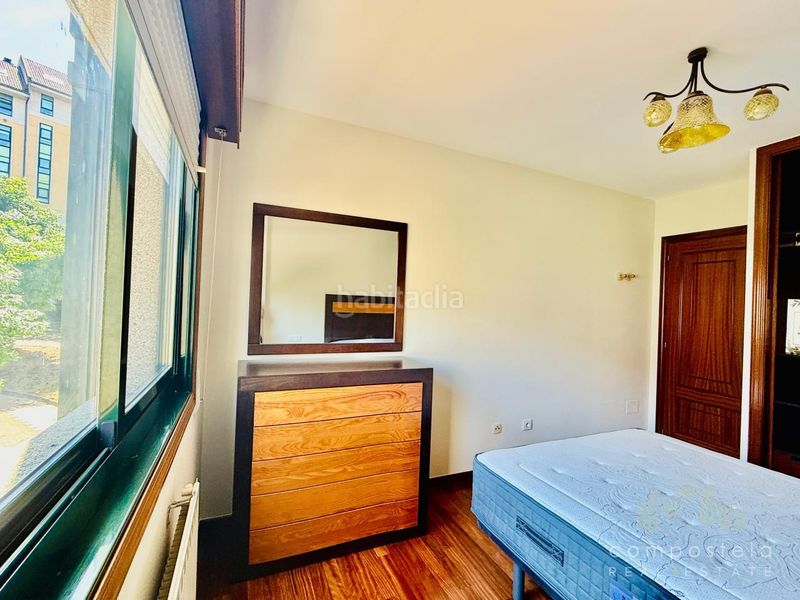 Foto 2a3d1396-d9a4-469f-b38a-2420dd348ba3. Rent flat with heating parking in O Milladoiro Ames