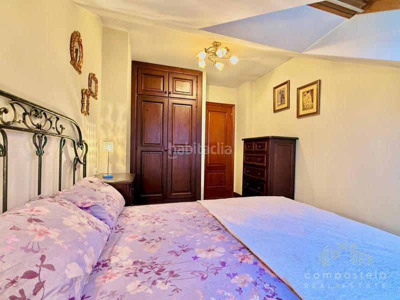 Foto 00038e7c-ce11-45f7-9400-56a9d8abc345. Duplex con riscaldamento parcheggio in O Milladoiro Ames