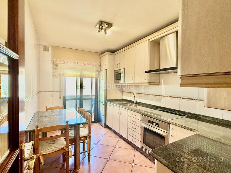 Foto 436070c3-c15b-4c25-8d75-0265c8f48782. Duplex con riscaldamento parcheggio in O Milladoiro Ames