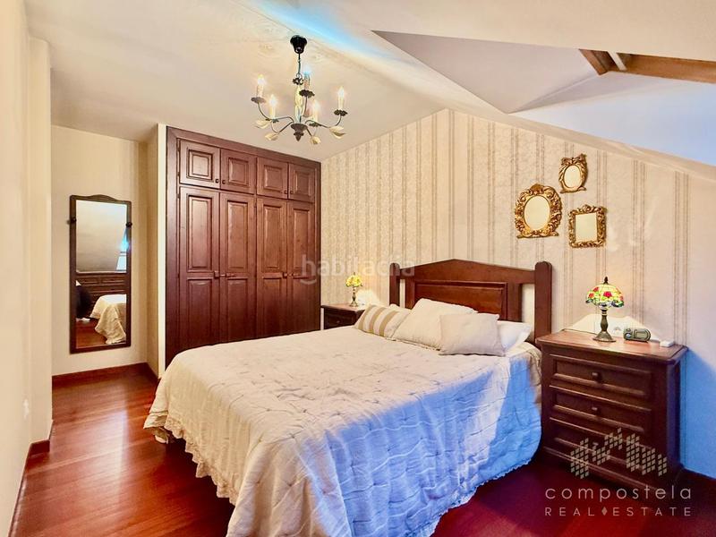 Foto 8b949263-f806-4d85-aa2c-21df56dd87bd. Duplex con riscaldamento parcheggio in O Milladoiro Ames
