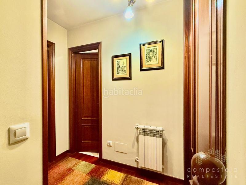 Foto f6a6cd55-1200-4e05-9c34-e481505e3b96. Duplex con riscaldamento parcheggio in O Milladoiro Ames
