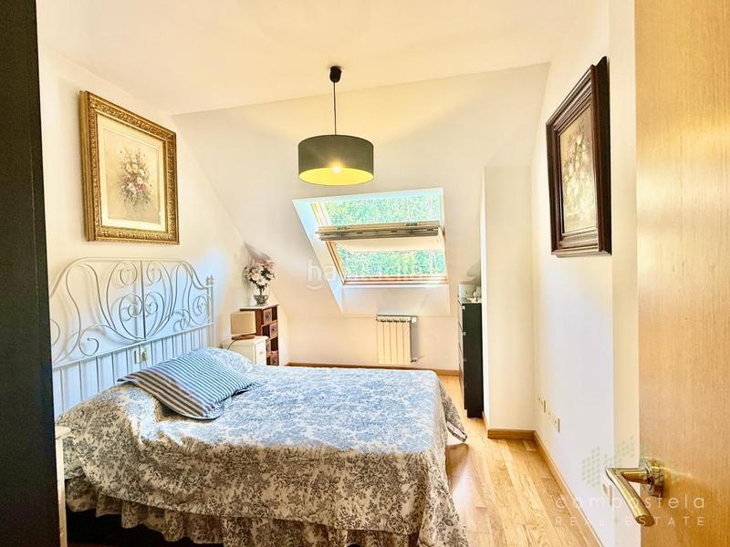 Foto 21ea5e26-ce23-4df7-8578-132f0723fb26. Rent penthouse with heating parking in O Milladoiro Ames