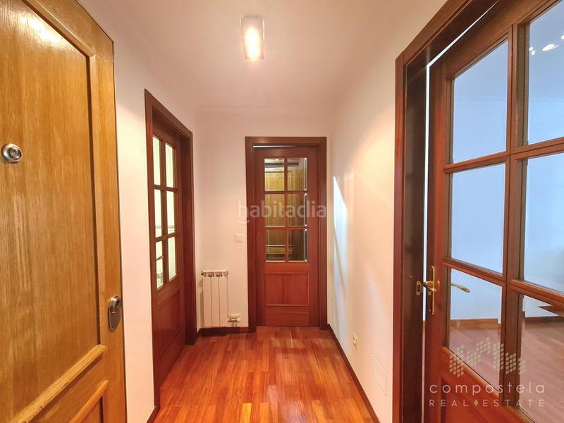 Foto 2b9c130f-d891-4053-ab85-d61b0e7cc9c6. Rent flat with heating parking in O Milladoiro Ames