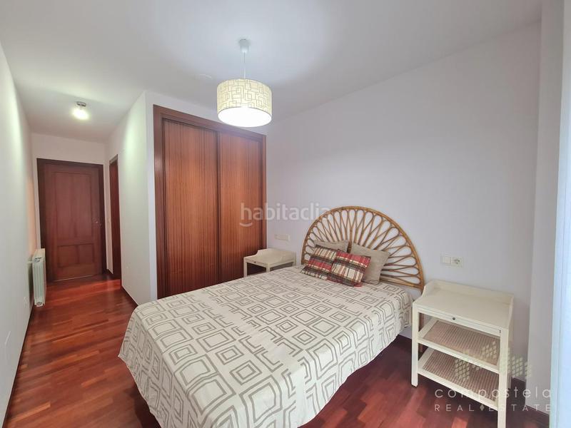 Foto 8c6c43ad-af7e-4c8b-a5d4-19ea504cca90. Rent flat with heating parking in O Milladoiro Ames