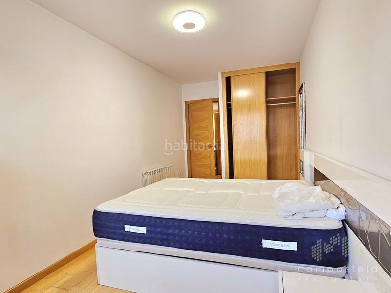 Foto f928890c-6c61-4e77-9468-197c0bd80814. Rent flat with heating parking in O Milladoiro Ames
