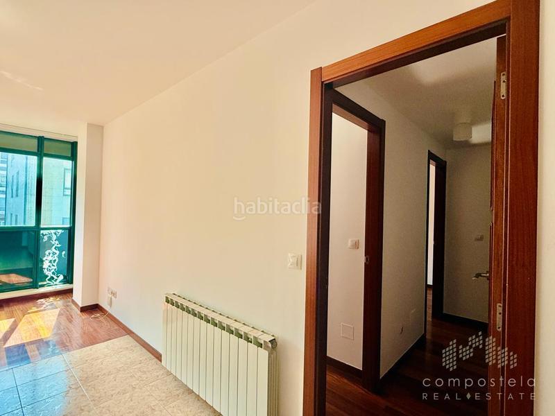 Foto 4e234ddb-0779-407c-b5c5-9394d0c0b834. Flat with heating parking in O Milladoiro Ames