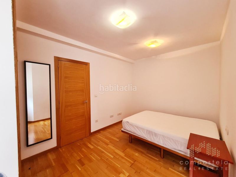Foto 01f8221c-a434-44e0-9efd-84896366a052. Rent flat with heating parking in O Milladoiro Ames