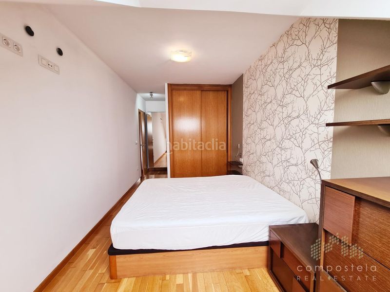 Foto 1791b609-45f3-42e2-ab58-178d73bb0fa9. Rent flat with heating parking in O Milladoiro Ames