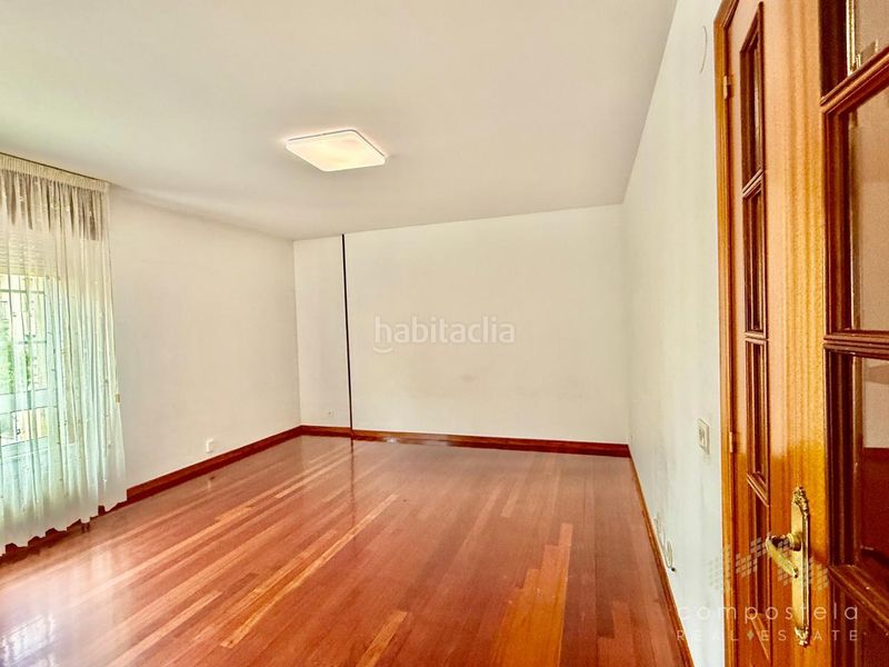 Foto 302d16c3-1e95-46cd-9900-fea0f52ff8a4. Rent flat with heating parking in O Milladoiro Ames