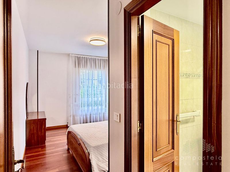 Foto 36353ce0-d032-4930-9697-b36ca70ed811. Rent flat with heating parking in O Milladoiro Ames