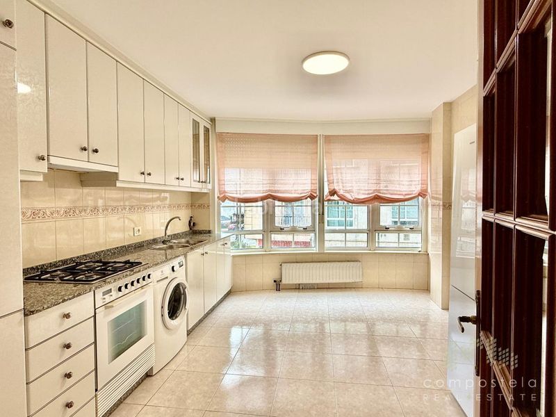 Foto 8185dc89-2c98-40af-9f35-fa3b3a2902b8. Rent flat with heating parking in O Milladoiro Ames