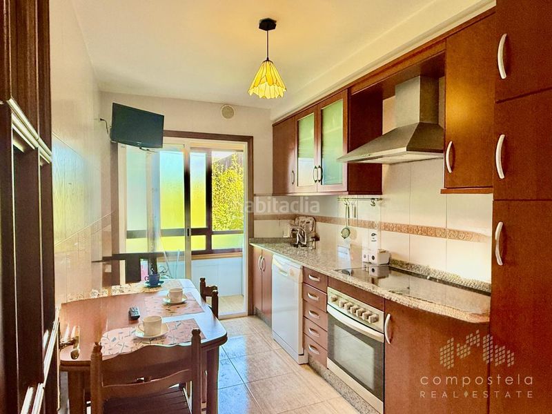 Foto 81006332-aaaa-481b-8e5b-7b8f81087937. Flat with heating parking in O Milladoiro Ames