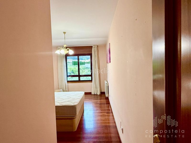 Foto 9a0bb097-efa8-4280-8943-6c509d4a1845. Flat with heating parking in O Milladoiro Ames