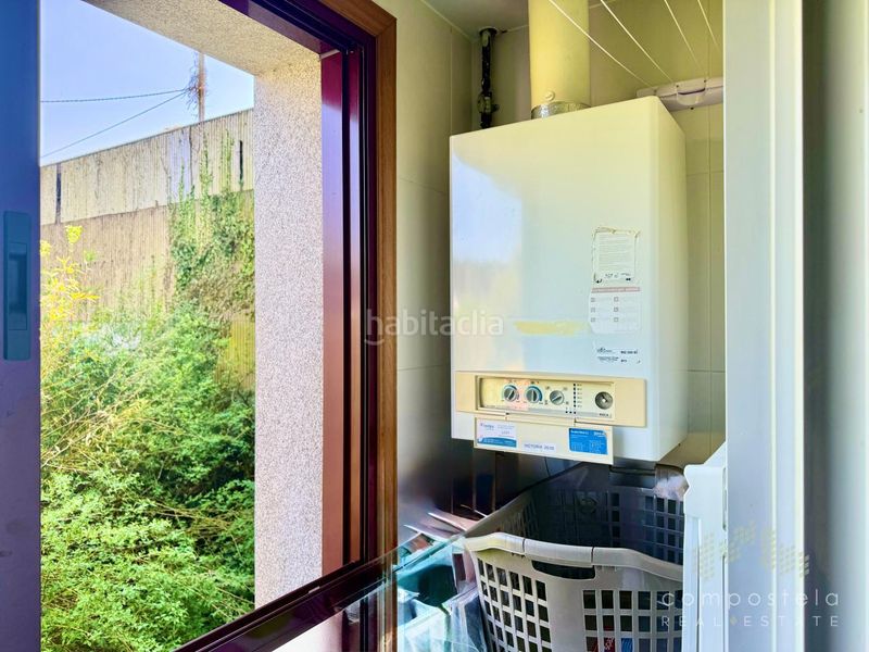 Foto c1e6276d-9674-4409-9f6a-7881c6488760. Flat with heating parking in O Milladoiro Ames