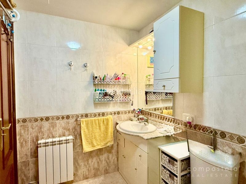 Foto d7980740-77fd-4672-97ef-dbeb233b5efc. Flat with heating parking in O Milladoiro Ames