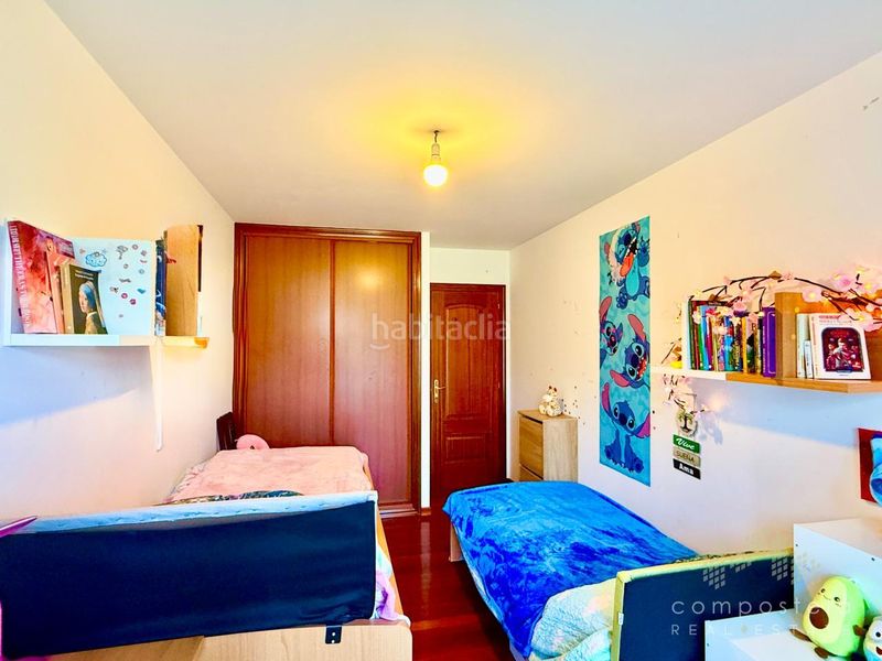 Foto eb2c19bb-a853-4b88-8a74-2a59def0340f. Flat with heating parking in O Milladoiro Ames