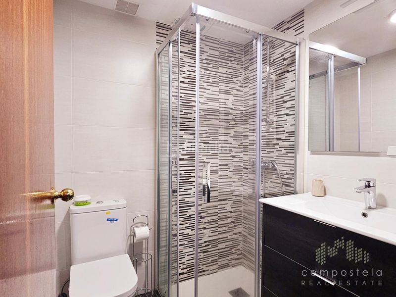 Foto eaf046ba-12f6-46fc-8acc-8008bfffac2f. Rent flat with heating parking in O Milladoiro Ames