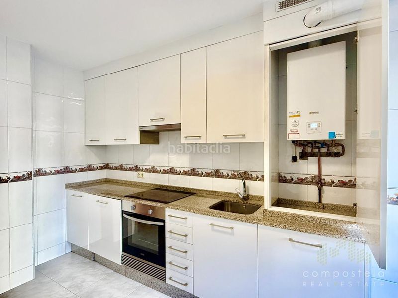 Foto 194ab178-a488-4737-aa4c-af59a02d7b03. Flat with heating parking in O Milladoiro Ames