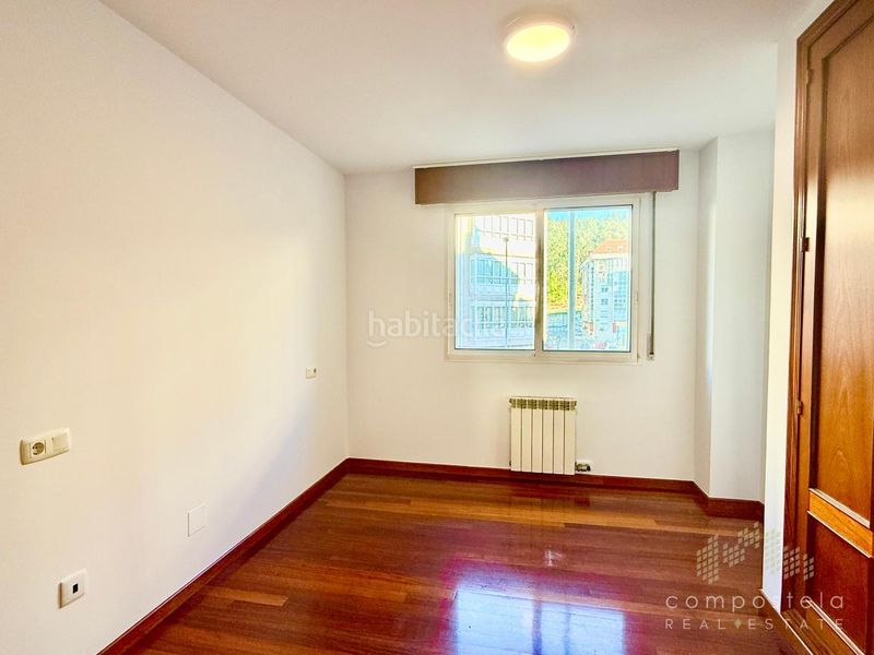 Foto 6686f744-e0c6-4b34-bc3c-9070237daf69. Flat with heating parking in O Milladoiro Ames