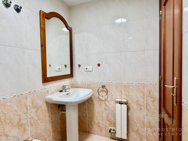 Foto 769e7525-b86e-4ddc-b21e-10f487bf5355. Flat with heating parking in O Milladoiro Ames