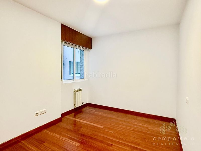 Foto 92368ba9-ede4-45e5-a2f9-b731e6fb0e53. Flat with heating parking in O Milladoiro Ames