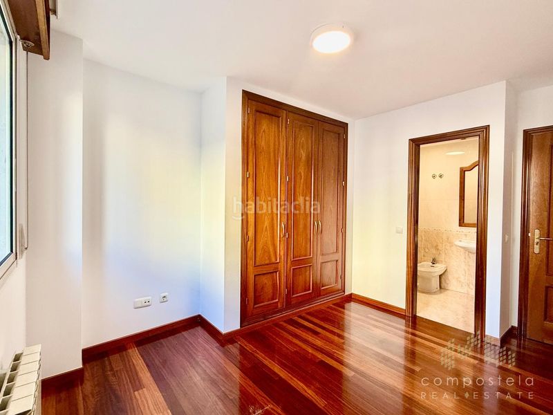 Foto f44776f5-9253-4937-8376-f80218acab00. Flat with heating parking in O Milladoiro Ames