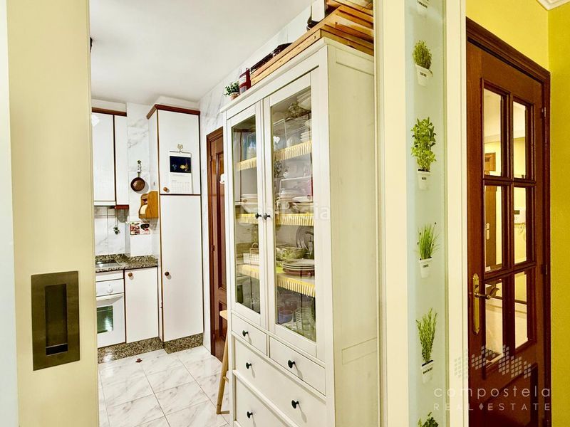 Foto 4f3ae55c-64b2-4f58-a353-652e8a6739cf. Flat with heating parking in O Milladoiro Ames