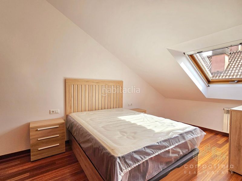 Foto 4a344e8f-ba45-49f7-8d87-1b0c84a3c9be. Rent duplex with heating parking in O Milladoiro Ames