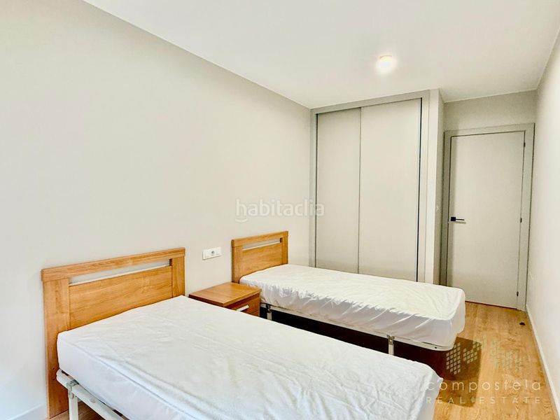 Foto 7f25c7e6-ad10-48dd-a572-dae4c6602f69. Flat with heating parking in O Milladoiro Ames