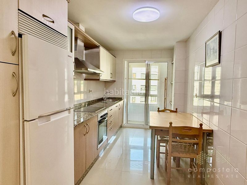 Foto a1e6b4d4-3ce5-4550-8bce-cc3cf5c4e927. Rent flat with heating parking in O Milladoiro Ames