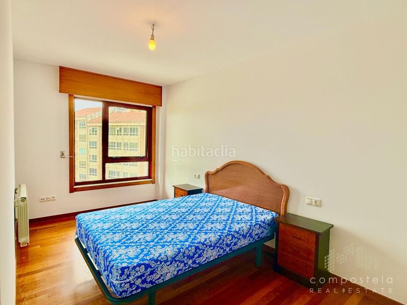 Foto 4f1dc534-4516-41db-bdea-c476bd1afb43. Rent flat with heating parking in O Milladoiro Ames