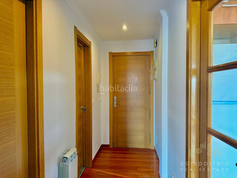 Foto 65507b8a-40a9-44b6-aa0d-b7ec793759df. Rent flat with heating parking in O Milladoiro Ames
