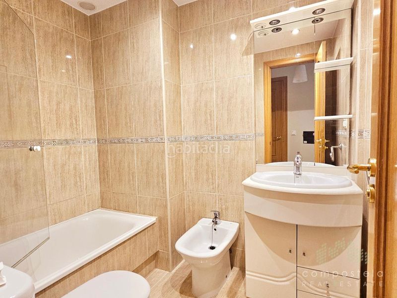 Foto 117fe41a-d93a-4fb2-9020-71b805be98ff. Flat with heating parking in O Milladoiro Ames