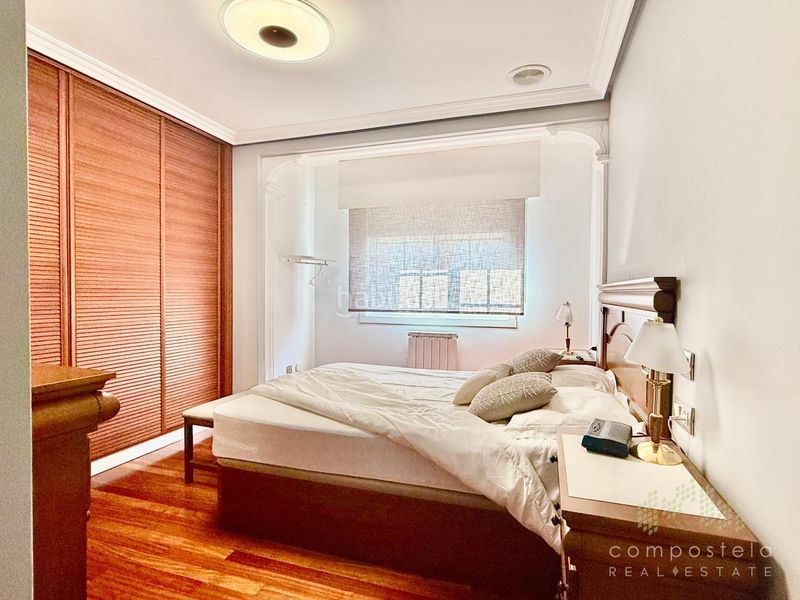 Foto 0bb7cc55-a4d9-481f-b762-7d2bb593e354. Rent flat with heating parking in O Milladoiro Ames